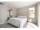 Bedroom featuring a comfortable bed, neutral tones, and an inviting atmosphere at 32627 N 70Th St, Scottsdale, AZ 85266