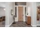 Bright entryway featuring a modern wood door, neutral walls and decorative accents at 32627 N 70Th St, Scottsdale, AZ 85266