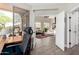 Well-lit office space connecting to the living area, with a large window and neutral decor at 32627 N 70Th St, Scottsdale, AZ 85266