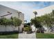 Exterior shot of the Brentwood Park Condominiums with mature landscaping and well-maintained lawns at 334 W Medlock Dr # D102, Phoenix, AZ 85013