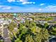 Wide aerial shot of neighborhood featuring a manicured park with mature trees and access to walking trails at 3365 W Thude Dr, Chandler, AZ 85226