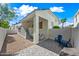Spacious backyard features low maintenance landscaping, a covered patio, and additional open patio space at 3365 W Thude Dr, Chandler, AZ 85226