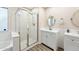 Clean bathroom featuring a glass enclosed shower, and a separate tub and vanity at 3365 W Thude Dr, Chandler, AZ 85226