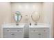 Bright bathroom with dual sinks, granite countertops, and modern fixtures at 3365 W Thude Dr, Chandler, AZ 85226