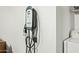 Electric vehicle charger in laundry room for convenient home charging at 3365 W Thude Dr, Chandler, AZ 85226