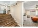 Hallway features stairs leading up to the kitchen and entryway to the bedroom at 3365 W Thude Dr, Chandler, AZ 85226