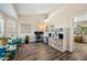 Spacious living room providing the perfect space for a home office, with stylish decor and plenty of light at 3365 W Thude Dr, Chandler, AZ 85226
