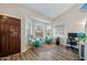 Cozy living room featuring wood flooring, and bright natural light, creating a welcoming atmosphere at 3365 W Thude Dr, Chandler, AZ 85226