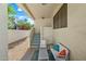Covered patio with a view of the home's second story and comfortable outdoor seating at 3365 W Thude Dr, Chandler, AZ 85226