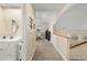 Upstairs hallway with view to bathroom, stairwell, and living space at 3365 W Thude Dr, Chandler, AZ 85226