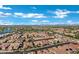 A stunning aerial panorama displaying a dense residential area, featuring lush greenery and winding roads at 3552 E Dogwood Dr, Chandler, AZ 85286