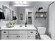 Cozy bathroom featuring white vanity, sink, and toilet at 3552 E Dogwood Dr, Chandler, AZ 85286