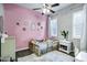 Charming bedroom with ceiling fan and fun decorations at 3552 E Dogwood Dr, Chandler, AZ 85286