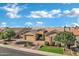 Well-maintained single-Gathering home with a lush front yard and a two-car garage, located in a serene neighborhood at 3552 E Dogwood Dr, Chandler, AZ 85286