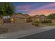 Beautiful single-story home boasts a spacious three-car garage and lush landscaping at 3552 E Dogwood Dr, Chandler, AZ 85286