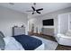 Spacious main bedroom features tile flooring, a lounge chair, and neutral decor at 3552 E Dogwood Dr, Chandler, AZ 85286