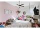 Spacious playroom with high ceilings, fan, carpet and lots of fun toys at 3552 E Dogwood Dr, Chandler, AZ 85286