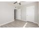 This bedroom features neutral walls and trim, with new wood-look flooring at 3824 N 8Th Ave, Phoenix, AZ 85013