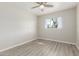 This bedroom features light gray walls, neutral trim, and a ceiling fan at 3824 N 8Th Ave, Phoenix, AZ 85013