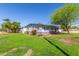 Single-story home with well-maintained landscaping and a lush lawn at 3824 N 8Th Ave, Phoenix, AZ 85013