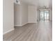 Bright living room featuring new gray vinyl floors and large windows at 3824 N 8Th Ave, Phoenix, AZ 85013