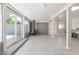 Bright living room featuring a modern fireplace, tile floors, and large windows offering natural light at 3824 N 8Th Ave, Phoenix, AZ 85013