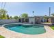 Inviting pool with backyard view of the house and a covered parking area, promising outdoor fun at 3824 N 8Th Ave, Phoenix, AZ 85013