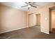 Bedroom featuring a mirrored closet and neutral carpet for a soothing and relaxing space at 4200 N Miller Rd # 228, Scottsdale, AZ 85251