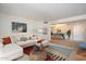 Spacious living room with a sectional sofa leading into a dining area, perfect for entertaining guests at 4200 N Miller Rd # 228, Scottsdale, AZ 85251