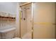 Tiled shower featuring a glass enclosure and modern shower head, for a clean look at 4200 N Miller Rd # 228, Scottsdale, AZ 85251