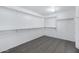 Spacious walk-in closet with shelving for storage and organization at 43232 W Magnolia Rd, Maricopa, AZ 85138