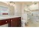 Modern bathroom with walk-in shower, stylish vanity, and neutral color scheme at 4716 W Hayward Ave, Glendale, AZ 85301
