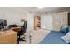 Comfortable bedroom featuring a well-lit workspace and a cozy daybed at 4716 W Hayward Ave, Glendale, AZ 85301