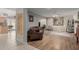 Elegant living room with hardwood floors, decorative mirror, and comfortable seating at 4716 W Hayward Ave, Glendale, AZ 85301