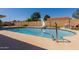 Enjoy the pool with a slide, complemented by a beautifully tiled pool deck at 4716 W Hayward Ave, Glendale, AZ 85301