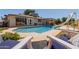 Inviting backyard pool with sun loungers, perfect for enjoying sunny days at 4716 W Hayward Ave, Glendale, AZ 85301