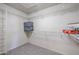 Walk-in closet with shelving, neutral walls, and carpeting at 5323 E Hopi Ave, Mesa, AZ 85206