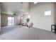 Spacious living room with plush carpet and abundant natural light at 5323 E Hopi Ave, Mesa, AZ 85206
