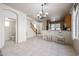 Bright living area showcasing tile floors, staircase, and open layout at 5323 E Hopi Ave, Mesa, AZ 85206