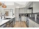 Well-lit kitchen featuring modern appliances and cabinetry, with sleek countertops at 5406 E Charleston Ave, Scottsdale, AZ 85254