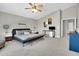 Relaxing main bedroom featuring neutral carpets and furnishings at 5406 E Charleston Ave, Scottsdale, AZ 85254