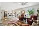 Bright and open living space features a modern kitchen, access to the back yard, and comfortable seating at 5528 E Virginia Ave, Phoenix, AZ 85008