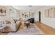 Bright living room with hardwood floors and built-in shelves at 5738 N 34Th S Dr, Phoenix, AZ 85017