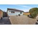 A low-maintenance backyard with gravel and privacy fence, ideal for relaxation at 6108 S Wilson Dr, Chandler, AZ 85249