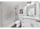 Well-lit bathroom featuring a tiled shower, toilet, sink, vanity and neutral colors at 6108 S Wilson Dr, Chandler, AZ 85249