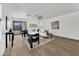 Spacious living room with wood floors and lots of light from sliding glass door at 6108 S Wilson Dr, Chandler, AZ 85249