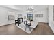 Bright living room featuring wood floors, modern decor, and a ceiling fan at 6108 S Wilson Dr, Chandler, AZ 85249