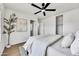 Cozy bedroom with neutral tones and a ceiling fan at 6108 S Wilson Dr, Chandler, AZ 85249