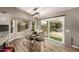 Cozy dining area featuring natural light and views of a backyard patio with seating at 6128 E Portia St, Mesa, AZ 85215