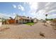 Expansive backyard featuring gravel landscaping, a small turf area, and fresh plantings at 6228 E Blanche Dr, Scottsdale, AZ 85254
